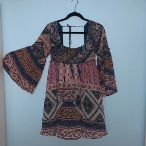 boho, babydoll dress with bell sleeves.